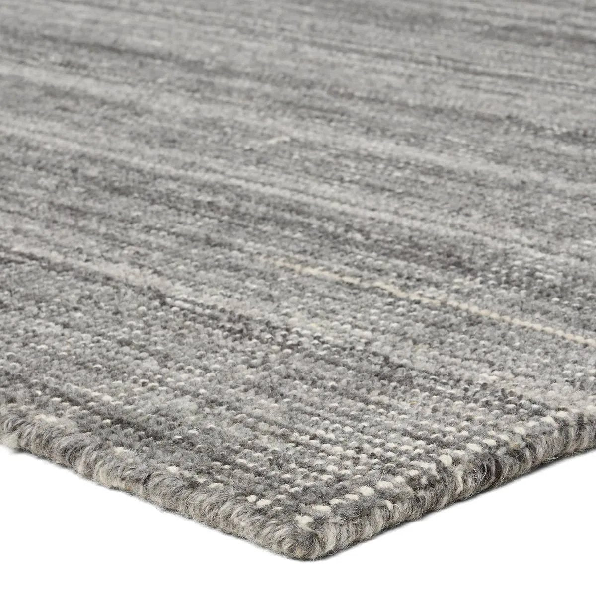 Subtle variations of gray create depth and dimension in the elegantly understated Hued rug. Handwoven with precision, its solid design offers a timeless foundation for any space—from modern to classic interiors.Handwove Amethyst Home provides interior design, new home construction design consulting, vintage area rugs, and lighting in the Miami metro area.
