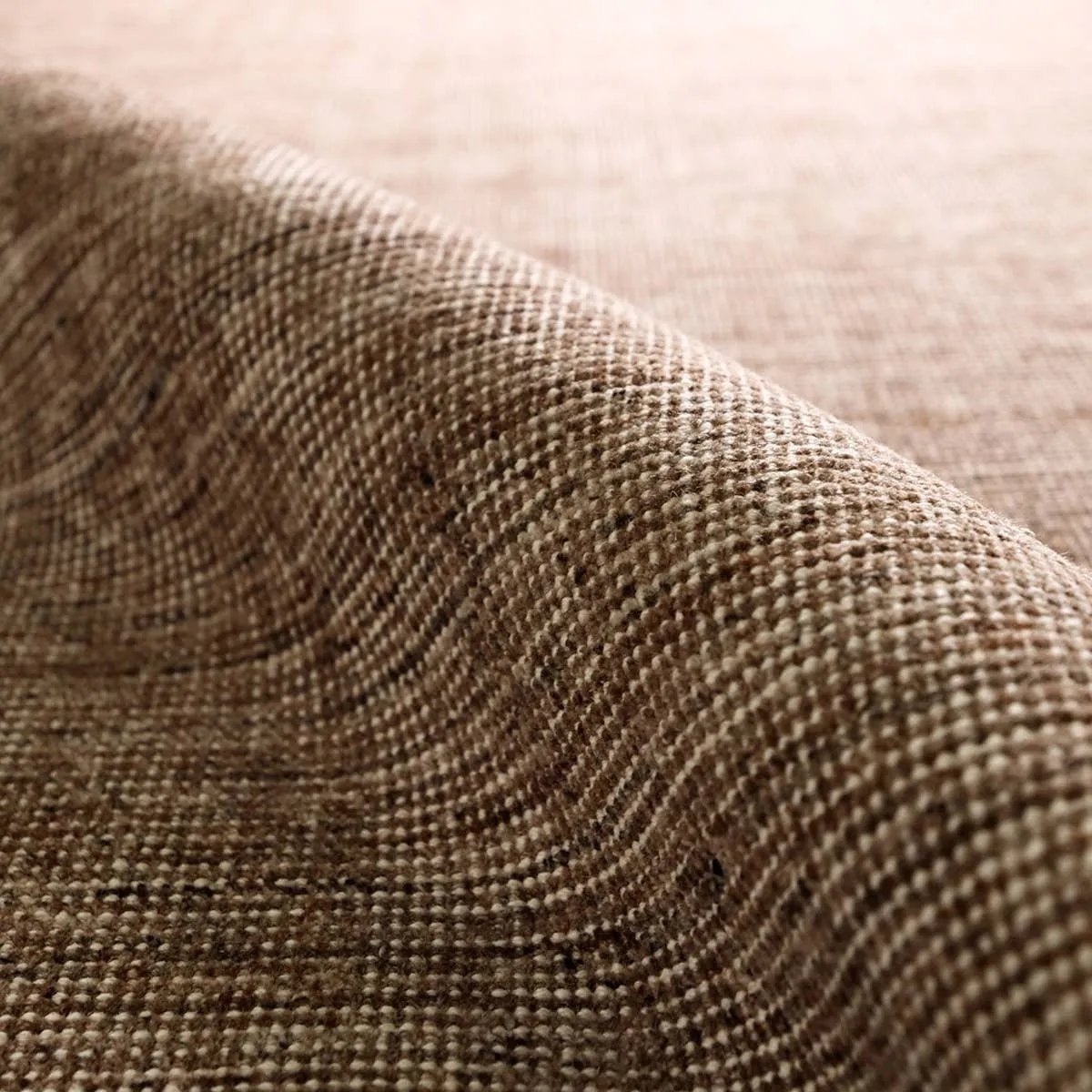 Subtle variations of brown create depth and dimension in the elegantly understated Hue rug. Handwoven with precision, its solid design offers a timeless foundation for any space—from modern to classic interiors.Handwove Amethyst Home provides interior design, new home construction design consulting, vintage area rugs, and lighting in the Park City metro area.