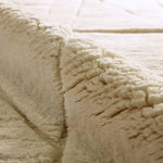 Embrace clean, simple elegance with the Ameln Jamun. As artisans knot each strand by hand, they weave in modern, centric lines that balance Moroccan heritage with contemporary edge. Made from lush New Zealand wool, the Jamun rug offers delicious dimension and a cloud-like texture, offering comfort with every step.Hand Knotte Amethyst Home provides interior design, new home construction design consulting, vintage area rugs, and lighting in the Houston metro area.
