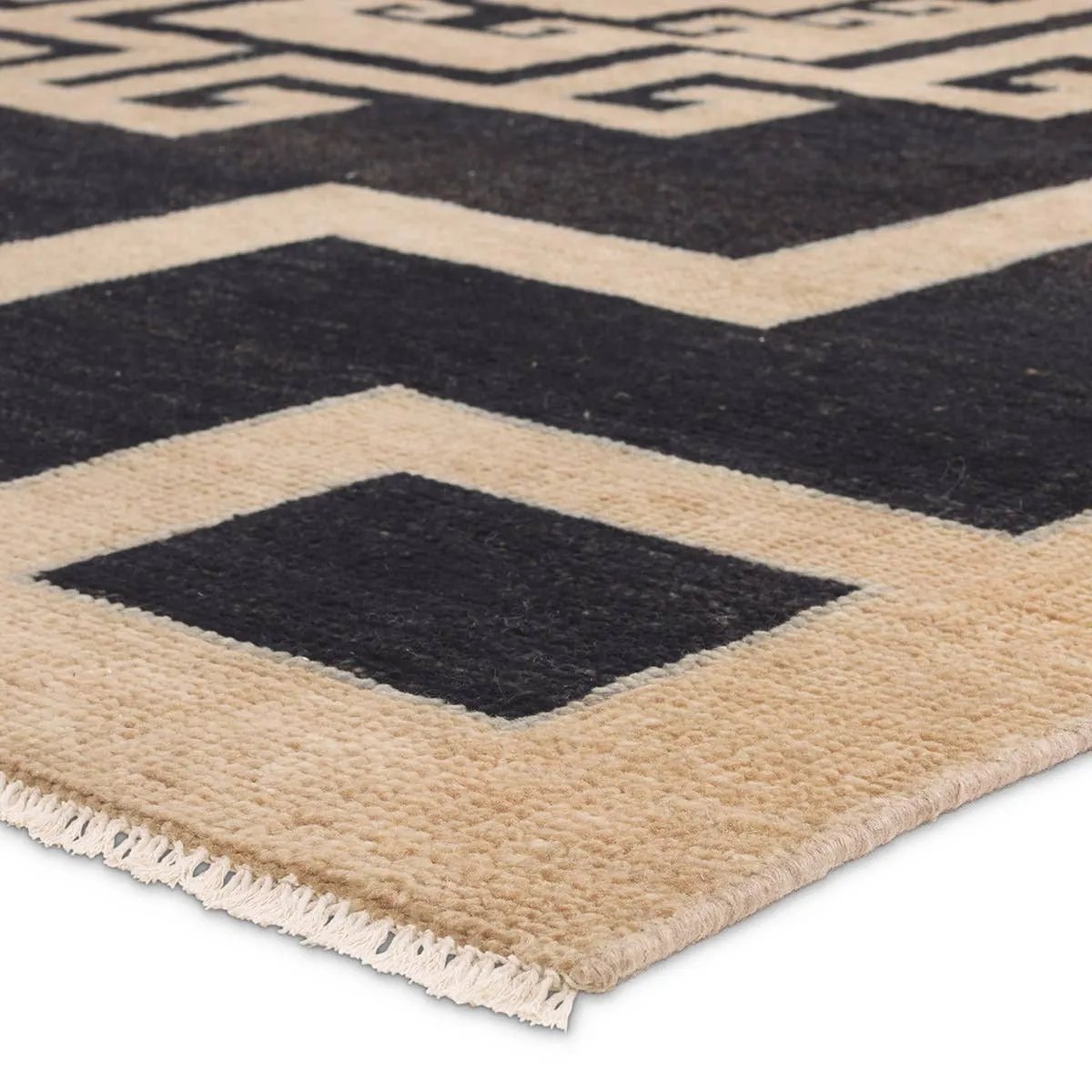 Anchor your space with a modern representation of vintage Kars designs through bold geometric design. Kyrenia?s striking, maze-like pattern guides eyes through any area. Hand knotted for durability with kid- and pet-friendly materials, it?s ideal for busy rooms.Hand Knotte Amethyst Home provides interior design, new home construction design consulting, vintage area rugs, and lighting in the Tampa metro area.