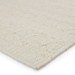 Featuring Leona Caldara Rug by Jaipur Living at Amethyst Home. The texture-rich Leona Caldara offers an assortment of updated kilim looks, re-invented with the on-trend shearling style and neutral, modern palettes. The handwoven Caldara rug features a globally inspired, cream base with hints of tan detailing. This 100% wool accent piece delights in high and lo. Amethyst Home provides interior design, new home construction design consulting, vintage area rugs, and lighting in the Boston metro area.