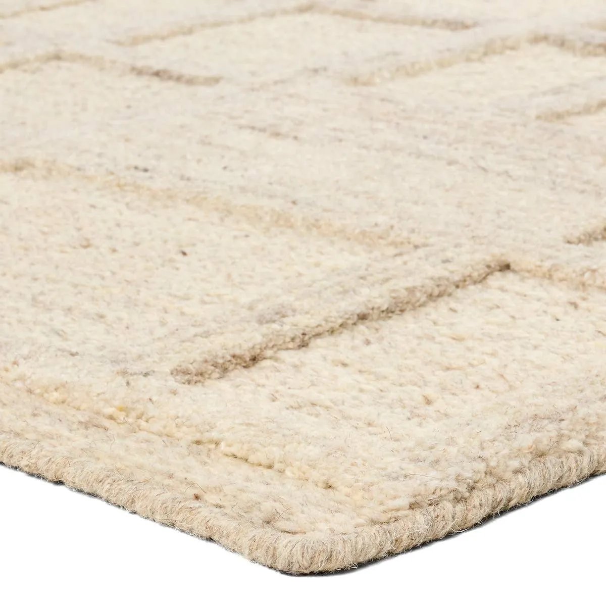 The Lustrous design features flowing waves of 100% premium undyed wool in soft cream tones. Its high-low texture creates movement, adding an earthy, elemental ease to any modern space. Crafted with care to mimic a soumak weave, this rug offers timeless elegance and a soft, tactile feel.Hand Tufte Amethyst Home provides interior design, new home construction design consulting, vintage area rugs, and lighting in the Austin metro area.