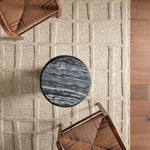 The Lustrous design features flowing waves of 100% premium undyed wool in soft cream tones. Its high-low texture creates movement, adding an earthy, elemental ease to any modern space. Crafted with care to mimic a soumak weave, this rug offers timeless elegance and a soft, tactile feel.Hand Tufte Amethyst Home provides interior design, new home construction design consulting, vintage area rugs, and lighting in the Houston metro area.