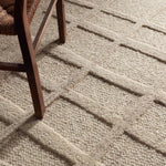 The Lustrous design features flowing waves of 100% premium undyed wool in soft cream tones. Its high-low texture creates movement, adding an earthy, elemental ease to any modern space. Crafted with care to mimic a soumak weave, this rug offers timeless elegance and a soft, tactile feel.Hand Tufte Amethyst Home provides interior design, new home construction design consulting, vintage area rugs, and lighting in the Kansas City metro area.