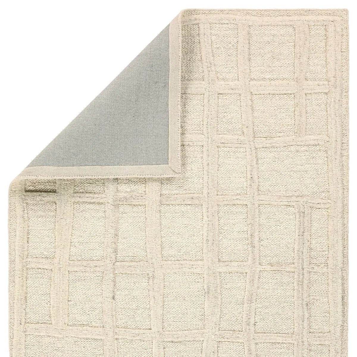 The Lustrous design features flowing waves of 100% premium undyed wool in soft cream tones. Its high-low texture creates movement, adding an earthy, elemental ease to any modern space. Crafted with care to mimic a soumak weave, this rug offers timeless elegance and a soft, tactile feel.Hand Tufte Amethyst Home provides interior design, new home construction design consulting, vintage area rugs, and lighting in the San Diego metro area.