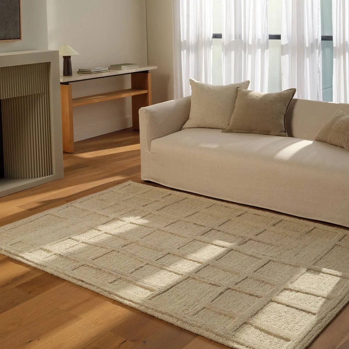 The Lustrous design features flowing waves of 100% premium undyed wool in soft cream tones. Its high-low texture creates movement, adding an earthy, elemental ease to any modern space. Crafted with care to mimic a soumak weave, this rug offers timeless elegance and a soft, tactile feel.Hand Tufte Amethyst Home provides interior design, new home construction design consulting, vintage area rugs, and lighting in the Seattle metro area.