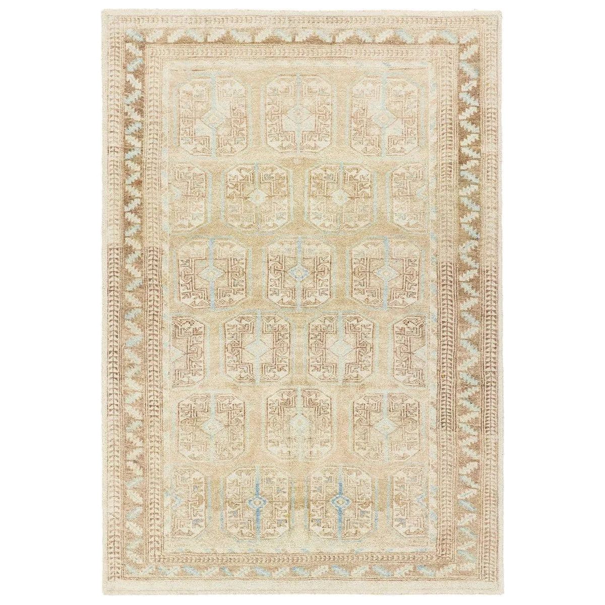 The Magnus design features a traditional pattern of small medallions set against a warm tan and beige backdrop, highlighted by subtle blue accents. Its vintage, distressed finish adds character and charm, making it feel like a treasured heirloom from the very first step.Hand Tufte Amethyst Home provides interior design, new home construction design consulting, vintage area rugs, and lighting in the Des Moines metro area.