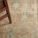 The Magnus design features a traditional pattern of small medallions set against a warm tan and beige backdrop, highlighted by subtle blue accents. Its vintage, distressed finish adds character and charm, making it feel like a treasured heirloom from the very first step.Hand Tufte Amethyst Home provides interior design, new home construction design consulting, vintage area rugs, and lighting in the Los Angeles metro area.