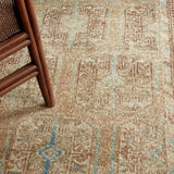 The Magnus design features a traditional pattern of small medallions set against a warm tan and beige backdrop, highlighted by subtle blue accents. Its vintage, distressed finish adds character and charm, making it feel like a treasured heirloom from the very first step.Hand Tufte Amethyst Home provides interior design, new home construction design consulting, vintage area rugs, and lighting in the Los Angeles metro area.