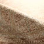 The Magnus design features a traditional pattern of small medallions set against a warm tan and beige backdrop, highlighted by subtle blue accents. Its vintage, distressed finish adds character and charm, making it feel like a treasured heirloom from the very first step.Hand Tufte Amethyst Home provides interior design, new home construction design consulting, vintage area rugs, and lighting in the Park City metro area.