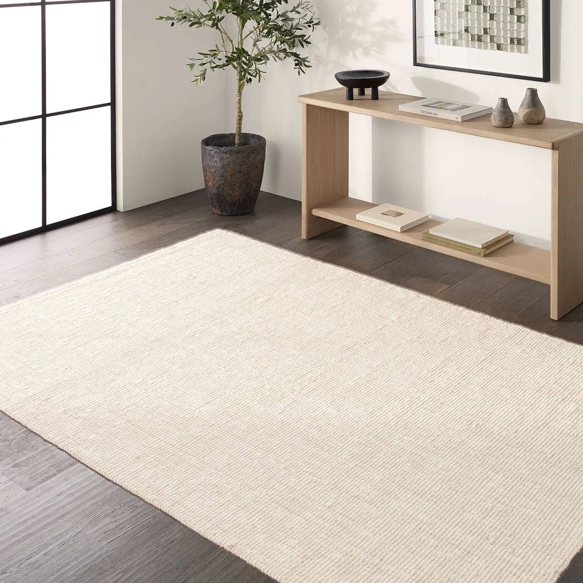 A fresh alternative to a solid rug, our Natural Tobago rug is 100% jute and has quickly become a designer go-to for modern, understated texture. Simple and sturdy, the Calm design is the perfect base for interiors that depend on texture to do the talking. Amethyst Home provides interior design, new home construction design consulting, vintage area rugs, and lighting in the Nashville metro area.