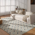 The Quinlan design reinvents timeless geometric patterns, fusing classic charm with a modern edge. Soft beige tones, punctuated by a blue accent, elevate any mid-century modern space. Handcrafted from naturally stain-resistant wool, this rug handles medium-traffic areas, kids, and pets with ease. Amethyst Home provides interior design, new home construction design consulting, vintage area rugs, and lighting in the Laguna Beach metro area.