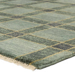 The Quinlan design reinvents timeless geometric grid patterns, fusing classic charm with a modern edge. Its beautiful blue hue elevates any mid-century modern space, while the 100% wool construction offers natural stain resistance. Stylish and durable, this piece is designed to stand the test of time.Hand Knotte Amethyst Home provides interior design, new home construction design consulting, vintage area rugs, and lighting in the Washington metro area.