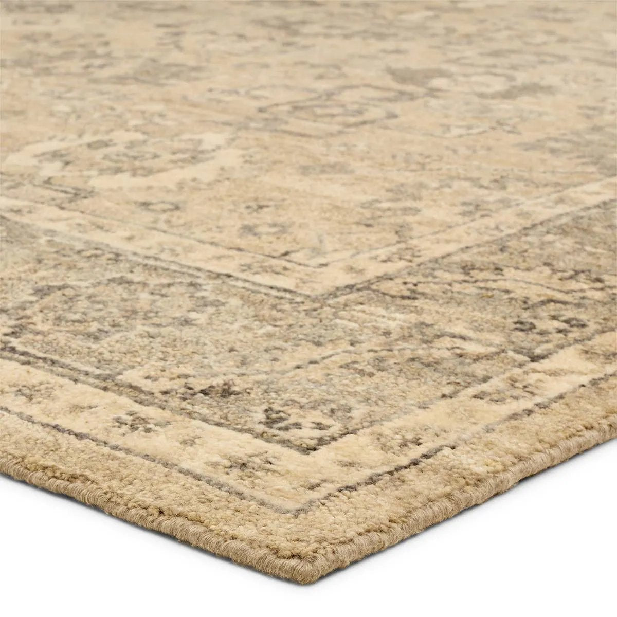 Where durability, style, and comfort come together, the Rhan rug's intricate design and sandy tones seamlessly settle into any space. This artisan-made rug is hand knotted, hand-carded, and handspun in India. It's soft to the touch and doesn't stain easily, so you can live more and worry less.Hand Knotte Amethyst Home provides interior design, new home construction design consulting, vintage area rugs, and lighting in the San Diego metro area.