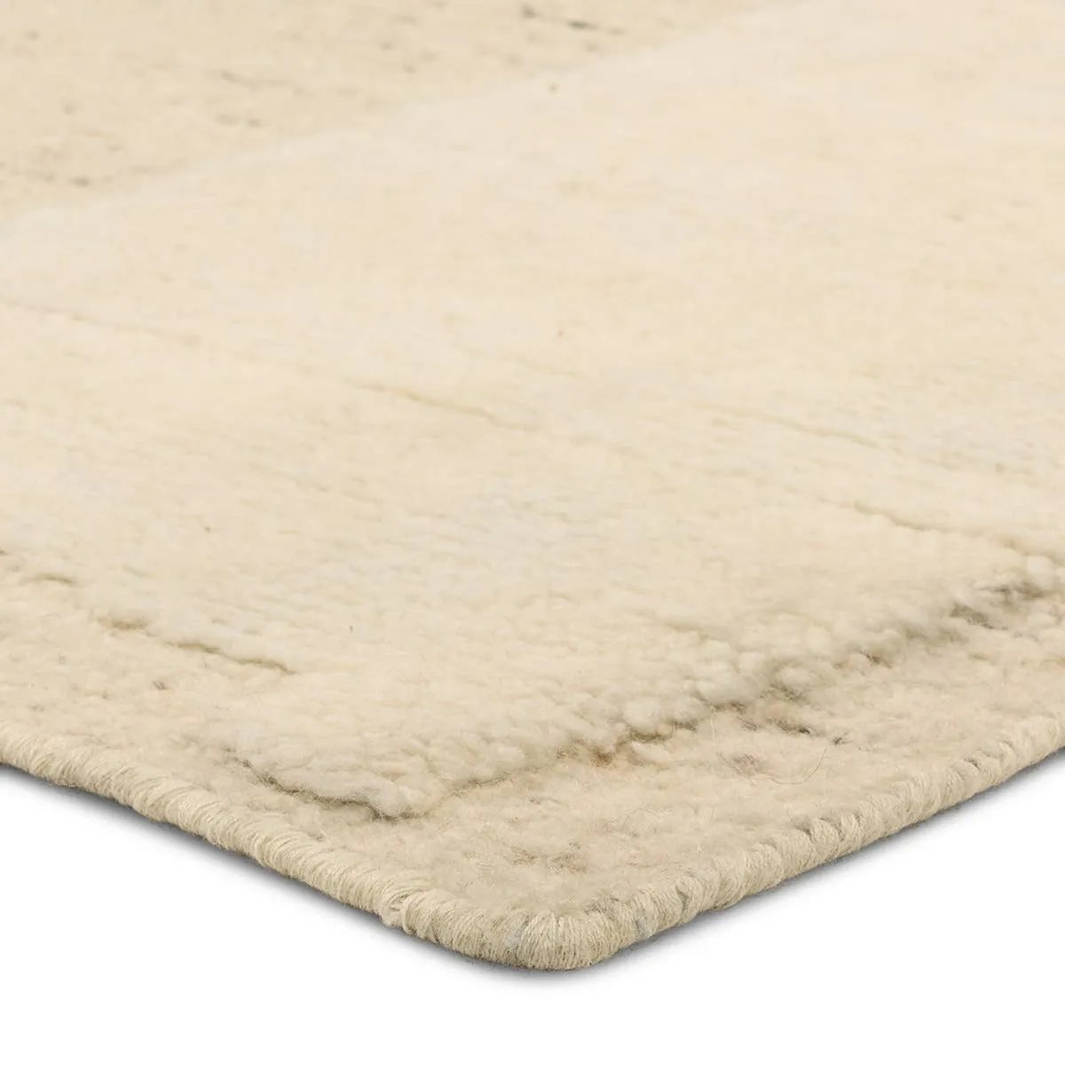 The Lasden Riya redefines contemporary style with large-scale geometric patterns hand-knotted on plush wool. The Riya design offers an inviting softness underfoot, while pleasing the eyes with its neutral tones and visual interest. A textured high-low effect brings the Brutalist pattern to life, adding tactile contrast that’s impossible to ignore. Amethyst Home provides interior design, new home construction design consulting, vintage area rugs, and lighting in the San Diego metro area.