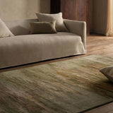 Infused with a whimsical spirit and sophisticated flair, the Genesis Ryenn brings an artistic edge to any contemporary home. The Ryenn design features an abstract, grounding green and brown pattern, enhanced with a lustrous sheen reminiscent of shimmering water reflections.Hand Tufte Amethyst Home provides interior design, new home construction design consulting, vintage area rugs, and lighting in the Alpharetta metro area.