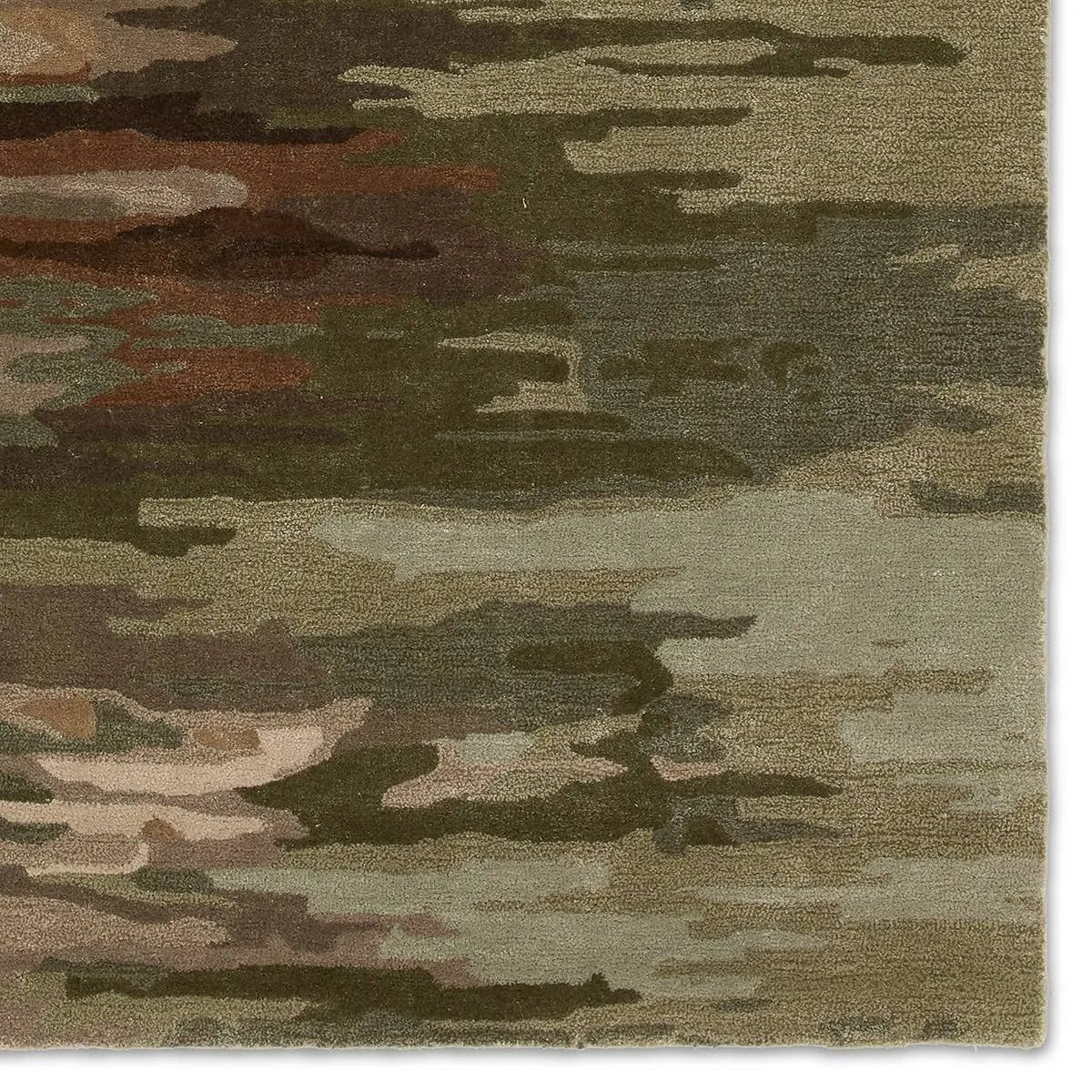 Infused with a whimsical spirit and sophisticated flair, the Genesis Ryenn brings an artistic edge to any contemporary home. The Ryenn design features an abstract, grounding green and brown pattern, enhanced with a lustrous sheen reminiscent of shimmering water reflections.Hand Tufte Amethyst Home provides interior design, new home construction design consulting, vintage area rugs, and lighting in the Tampa metro area.