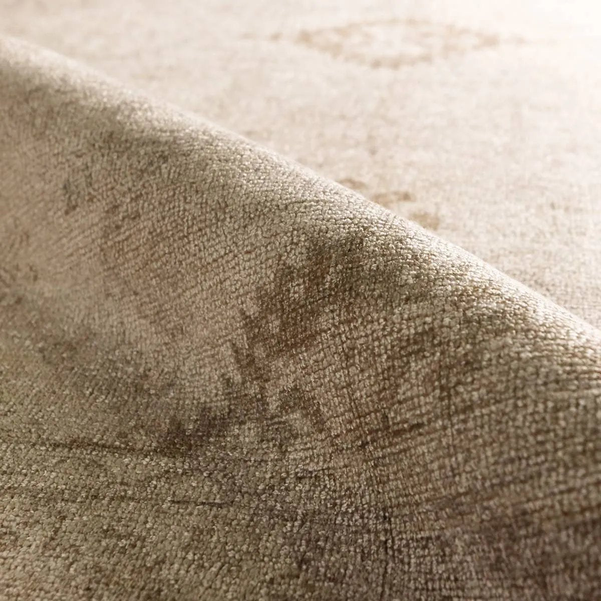 The Saffron design features a traditional pattern of small medallions, set against a warm tan and beige backdrop with subtle tan accents. Its vintage, distressed look adds character and charm, making it feel like a cherished heirloom from the very first step.Hand Tufte Amethyst Home provides interior design, new home construction design consulting, vintage area rugs, and lighting in the Alpharetta metro area.
