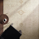 The Saffron design features a traditional pattern of small medallions, set against a warm tan and beige backdrop with subtle tan accents. Its vintage, distressed look adds character and charm, making it feel like a cherished heirloom from the very first step.Hand Tufte Amethyst Home provides interior design, new home construction design consulting, vintage area rugs, and lighting in the Houston metro area.