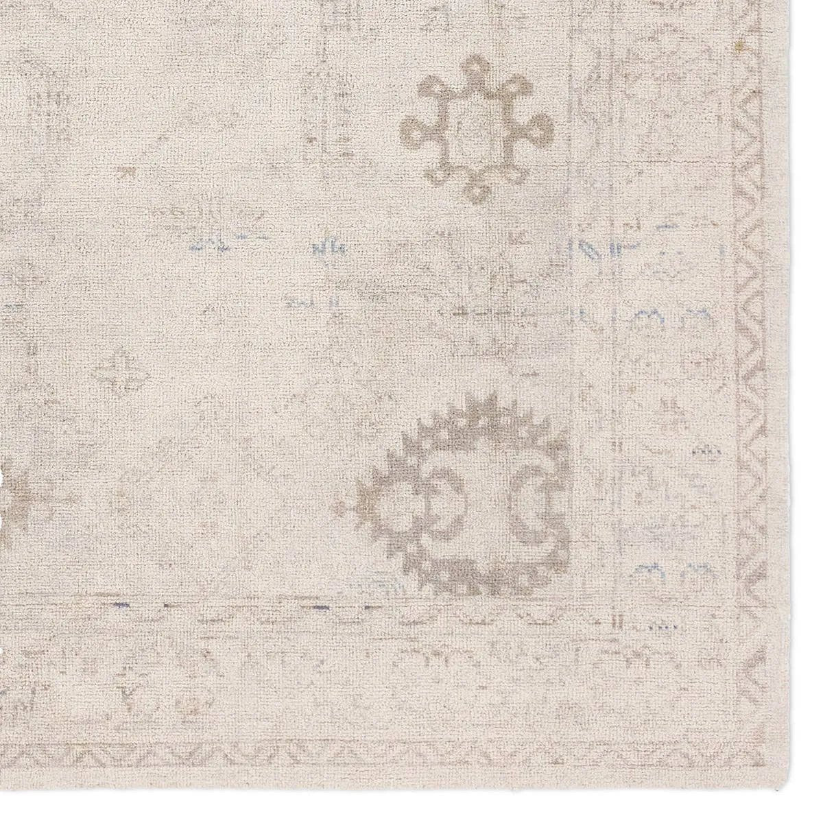 The Saffron design features a traditional pattern of small medallions, set against a warm tan and beige backdrop with subtle tan accents. Its vintage, distressed look adds character and charm, making it feel like a cherished heirloom from the very first step.Hand Tufte Amethyst Home provides interior design, new home construction design consulting, vintage area rugs, and lighting in the Los Angeles metro area.