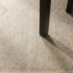 The Saffron design features a traditional pattern of small medallions, set against a warm tan and beige backdrop with subtle tan accents. Its vintage, distressed look adds character and charm, making it feel like a cherished heirloom from the very first step.Hand Tufte Amethyst Home provides interior design, new home construction design consulting, vintage area rugs, and lighting in the Seattle metro area.