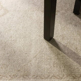 The Saffron design features a traditional pattern of small medallions, set against a warm tan and beige backdrop with subtle tan accents. Its vintage, distressed look adds character and charm, making it feel like a cherished heirloom from the very first step.Hand Tufte Amethyst Home provides interior design, new home construction design consulting, vintage area rugs, and lighting in the Seattle metro area.