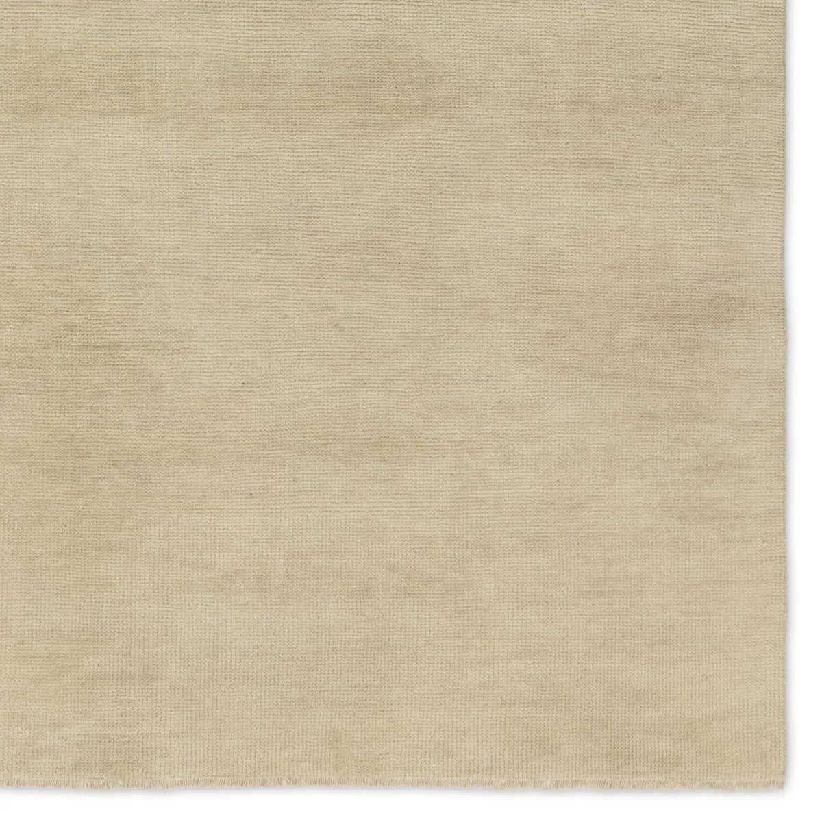 Featuring Saga Origin Hand-Knotted Rug by Jaipur Living at Amethyst Home. The sophisticated Saga Origin lends balance and a relaxed, grounding vibe to modern interiors. The Origin area rug anchors a space with a solid, subtly striated design in a neutral, ivory colorway. Hand knotted by skilled artisans, this durable wool accent marries simplicity and luxu. Amethyst Home provides interior design, new home construction design consulting, vintage area rugs, and lighting in the Des Moines metro area.