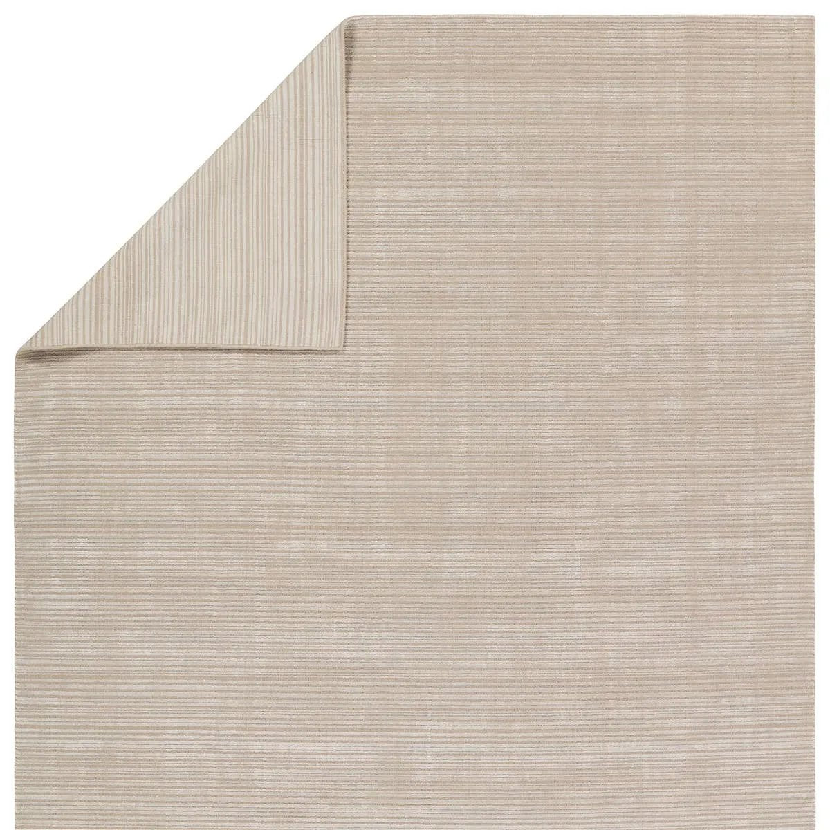 Featuring Second Sunset Gradient Rug by Jaipur Living at Amethyst Home. The easy-to-decorate, earthy tones of the Second Sunset Gradient prove that simplicity can sometimes be striking. The Gradient rug is hand loomed of durable wool and jasmine for a sumptuous and inviting hand. The variation in ivory and cream colors of this lustrous rug creates stunning dept. Amethyst Home provides interior design, new home construction design consulting, vintage area rugs, and lighting in the Omaha metro area.