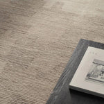 The hand-tufted Labyrinth Tenley presents abstract designs crafted from plush wool with a cut and looped pile, creating a rich, tactile texture. The Tenley design showcases a bold, geometric pattern with a modern brutalist influence in shades of gray and taupe, effortlessly adding depth and sophistication.Hand Tufte Amethyst Home provides interior design, new home construction design consulting, vintage area rugs, and lighting in the Calabasas metro area.