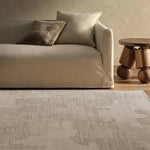 The hand-tufted Labyrinth Tenley presents abstract designs crafted from plush wool with a cut and looped pile, creating a rich, tactile texture. The Tenley design showcases a bold, geometric pattern with a modern brutalist influence in shades of gray and taupe, effortlessly adding depth and sophistication.Hand Tufte Amethyst Home provides interior design, new home construction design consulting, vintage area rugs, and lighting in the Park City metro area.