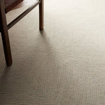 The handtufted Labyrinth Collection features abstract designs crafted from plush wool with a cut-and-looped pile, creating a rich, tactile texture. The Tulsi design showcases a bold, geometric pattern with modern Brutalist influence in varying shades of gray and taupe, adding depth and sophistication with its subtle tonal dimension.Hand Tufte Amethyst Home provides interior design, new home construction design consulting, vintage area rugs, and lighting in the Dallas metro area.