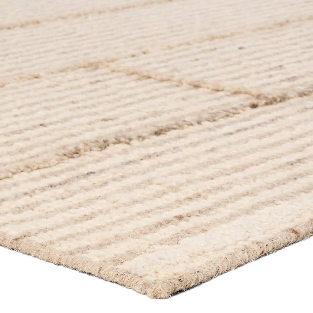 Earthy white and beige tones come together in a grounding linear design, infusing the Verena rug with contemporary elegance. Handwoven from a luxe wool pile, its luminous sheen highlights every intricate detail.Handwove Amethyst Home provides interior design, new home construction design consulting, vintage area rugs, and lighting in the Miami metro area.
