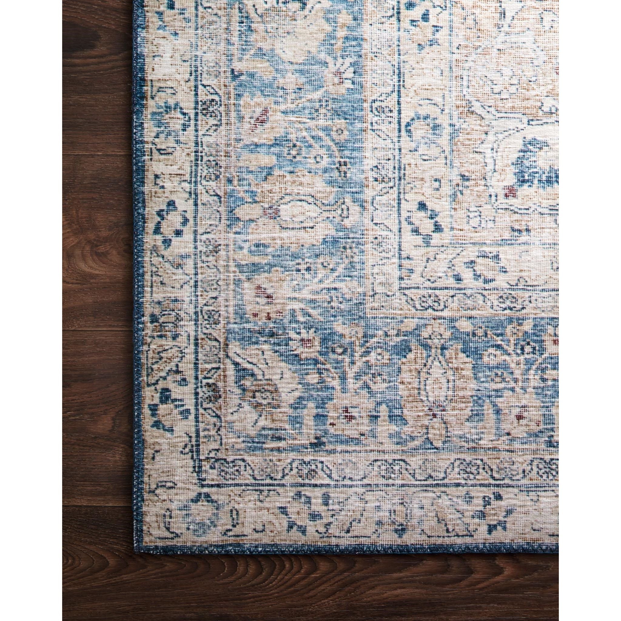 Featuring Layla Blue/Tangerine Runner by Loloi at Amethyst Home. The Layla Collection is traditional and timeless, with a beautiful lived-in design that captures the spirit of an old-world rug. This traditional power-loomed rug is crafted of 100% polyester with a classic and sophisticated color palette and subtle patina.

Power Loomed100% PolyesterLAY-07 Blue/.  Amethyst Home provides interior design, new home construction design consulting, vintage area rugs, and lighting in the Omaha metro area.