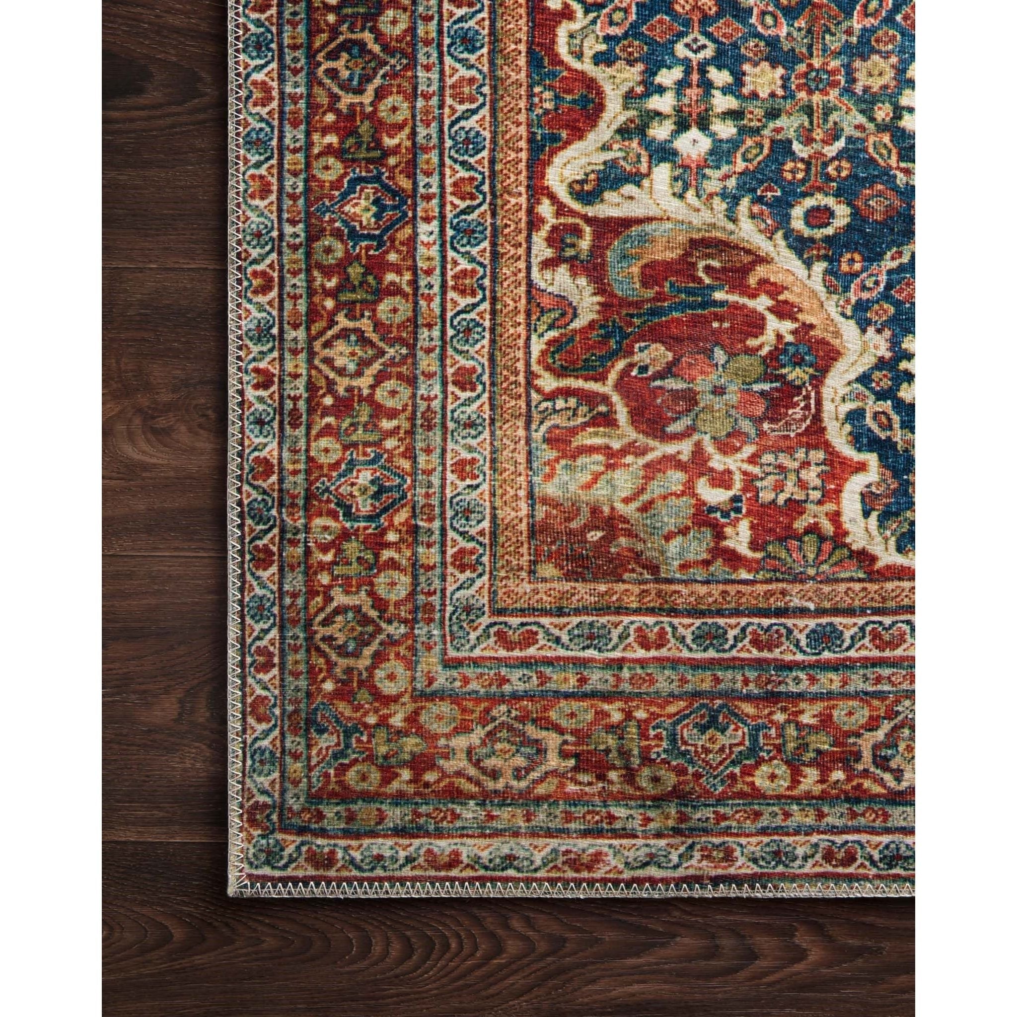 Perfect for families with kids and pets and very easy to clean and maintain. Comes in area, cute kitchen and hallway runners sizes. The rug is gorgeous with an intricate pattern and warms up the room with tones of blue, red, and ivory. The Layla Blue/Spice rug from Loloi captures the spirit of an old-world rug.