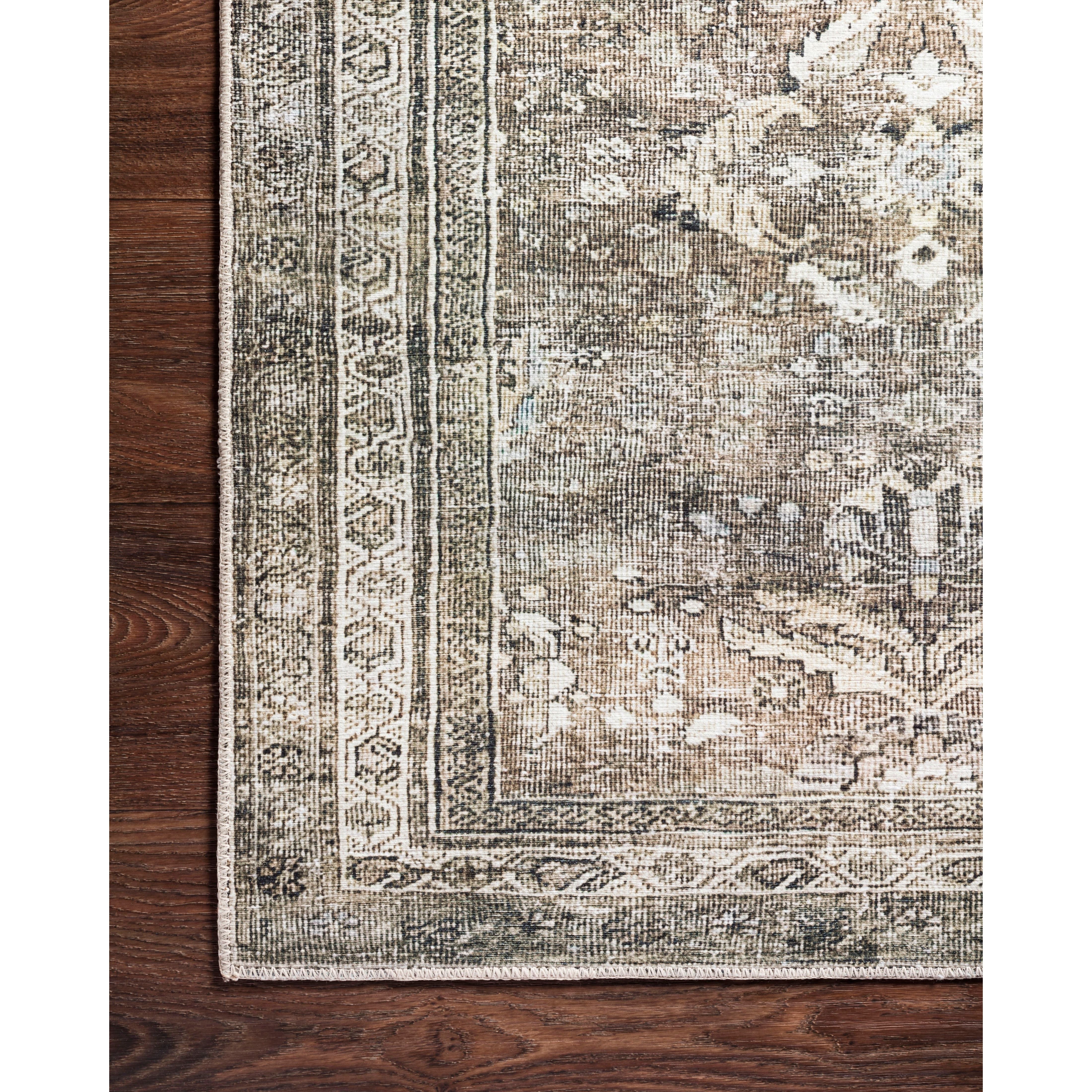 Perfect for families with kids and pets and very easy to clean and maintain. Comes in area, cute kitchen and hallway runners sizes. The rug has an intricate pattern and warms up the room with tones of green, brown, ivory, and hints of blue. The Layla Antique / Moss rug from Loloi captures the spirit of old-world rugs.