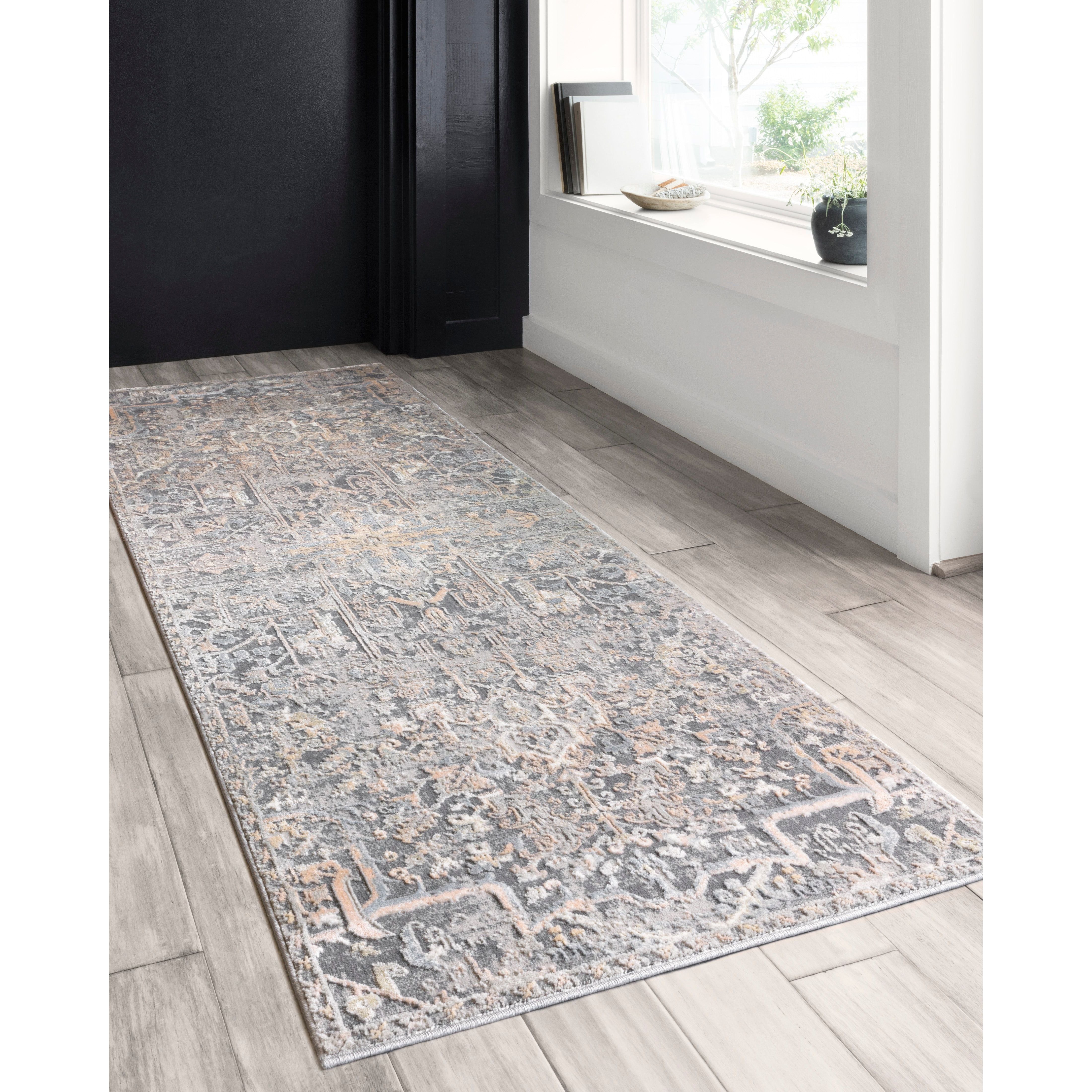 Lucia Charcoal/Multi Rug - Amethyst Home The Lucia Collection is a beautifully rich statement piece to add a layer of sophistication to any room. Power-loomed of polypropylene & polyester with a high/low pile and a curated color palette for a high-end look at an affordable price.