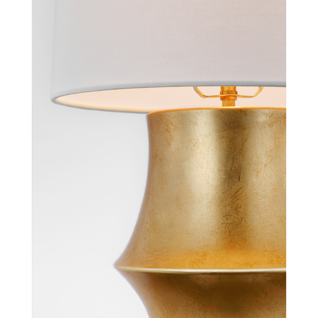 Featuring Lakmos Small Table Lamp Gild by Visual Comfort at Amethyst Home. The Lakmos by AERIN is an elegant play on modernist sculpture. The series features a sconce, pendant, table and floor lamps with curved designs that are both whimsical and sophisticated. Ideal illumination for almost any room in the home.
Overall Dimensions: 13" L x 13" W x 19.5" HWeight : 5 lbs.. Amethyst Home provides interior design, new construction, custom furniture, and area rugs in the Charlotte metro area