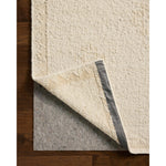 The Alara Collection is a unique and refined area rug that combines finely spun jute with chunky wool for dynamic pile juxtaposition. A neutral ivory palette with natural color variation makes it an elegant addition to home decor in living rooms, bedrooms, and more. Amethyst Home provides interior design, new home construction design consulting, vintage area rugs, and lighting in the Los Angeles metro area.