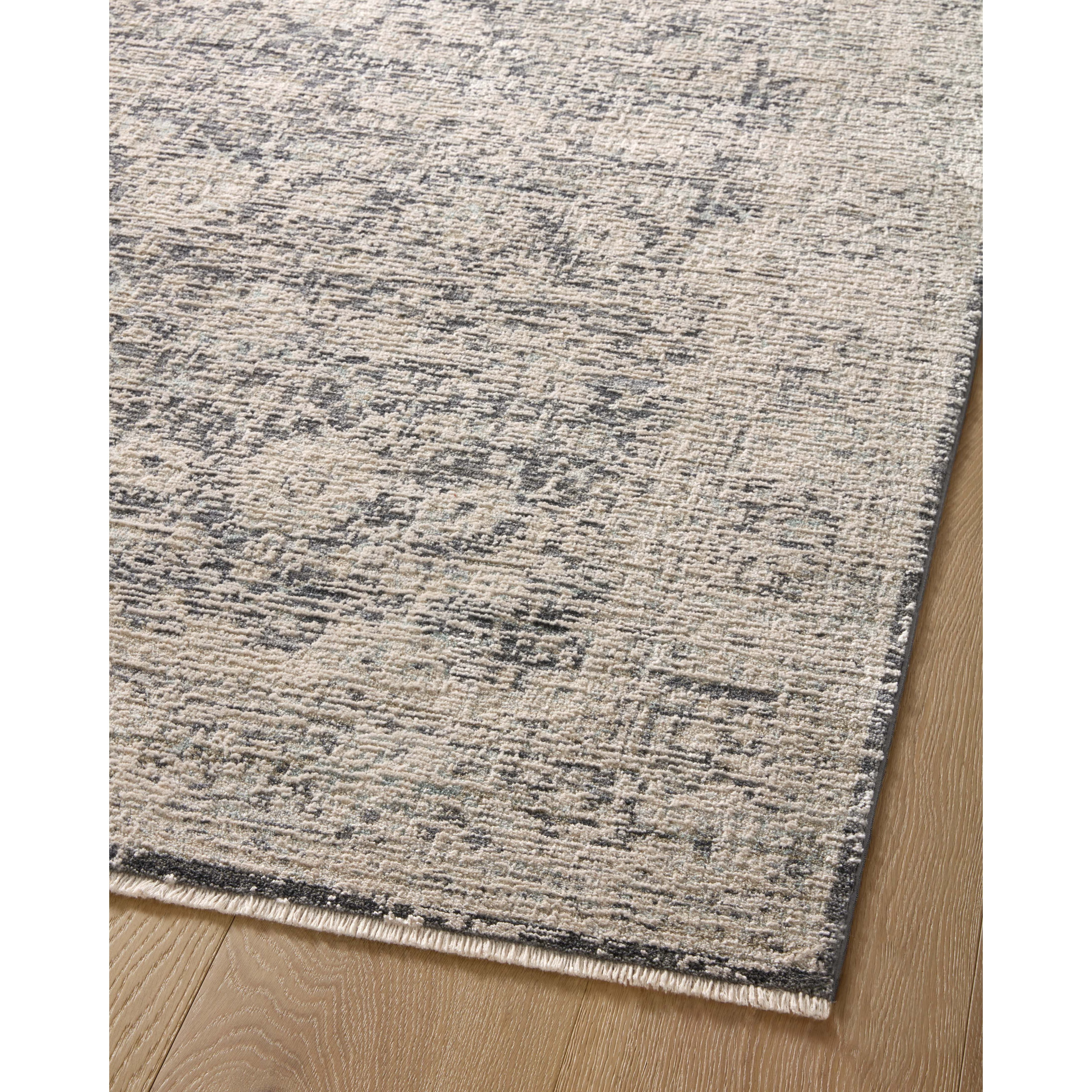 Amber Lewis x Loloi Alie Charcoal / Beige Rug have an elevated antique look and plush, modern feel. The rug’s underlying traditional motif is overlaid with a slightly higher pile that creates a softening effect like early morning fog. Amethyst Home provides interior design services, furniture, rugs, and lighting in the Los Angeles metro area.