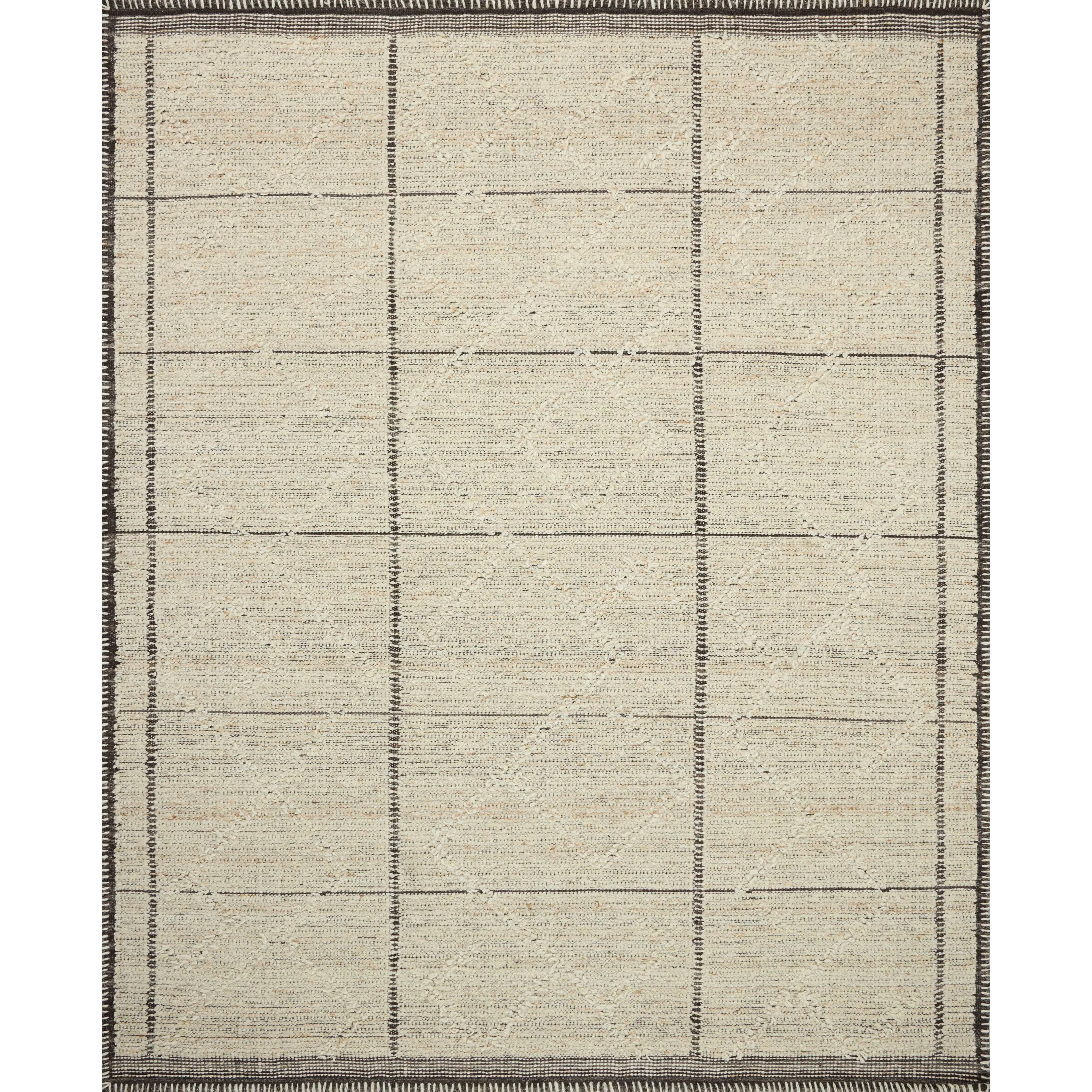 Beautifully crafted by hand, the Bowie Collection by Amber Lewis x Loloi is a textured area rug with an earthy, organic aesthetic. The pile has a flatweave base with chunkier, slightly raised geometric motifs and whipstitched edges. It’s an elegant yet easy-to-work-with rug for living rooms, bedrooms, and other high-traffic areas of the home. Amethyst Home provides interior design, new home construction design consulting, vintage area rugs, and lighting in the Austin metro area.