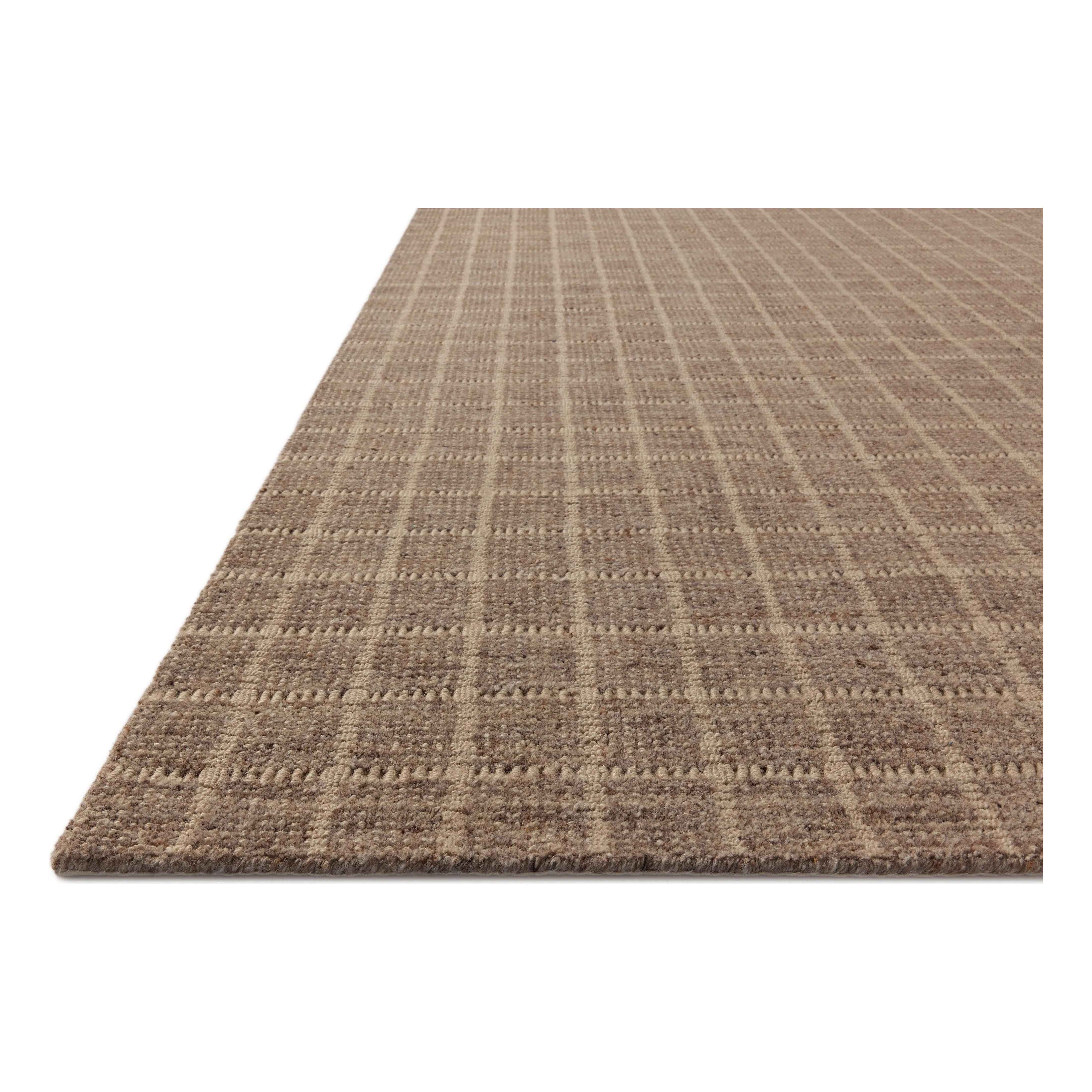 The Cedar Collection by Amber Lewis x Loloi is a hand-loomed area rug with a clean gridded design in contrasting ivory. The rugs blended wool and cotton pile is substantial and soft, with flecked tones that add depth to the neutral palette. Amethyst Home provides interior design, new home construction design consulting, vintage area rugs, and lighting in the Scottsdale metro area.