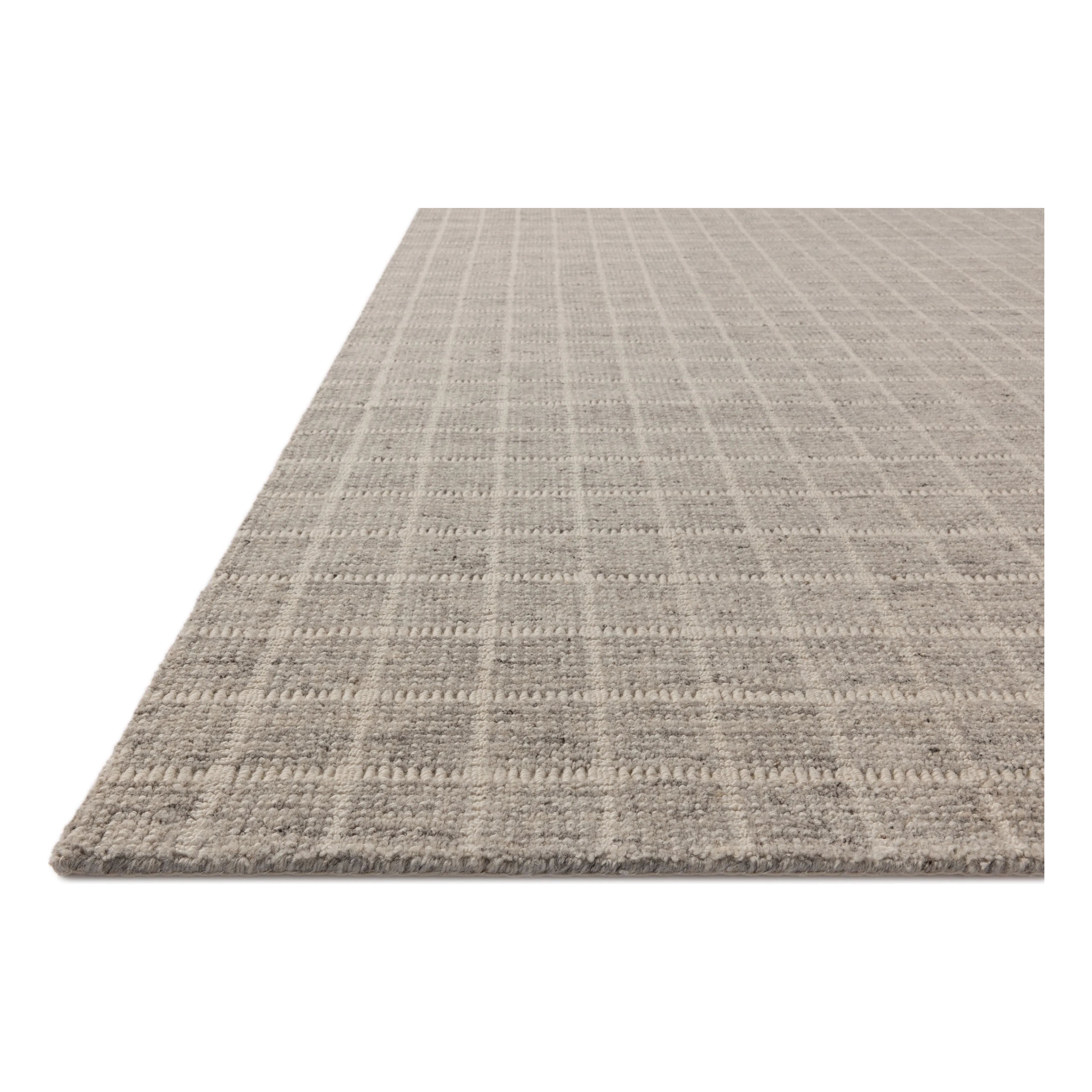 Featuring Amber Lewis x Loloi Cedar Grey / Ivory Rug by Loloi at Amethyst Home. The Cedar Collection by Amber Lewis x Loloi is a hand-loomed area rug with a clean gridded design in contrasting ivory. The rugs blended wool and cotton pile is substantial and soft, with flecked tones that add depth to the neutral palette. This collection is hand-loomed of woo. Amethyst Home provides interior design, new home construction design consulting, vintage area rugs, and lighting in the Washington metro area.