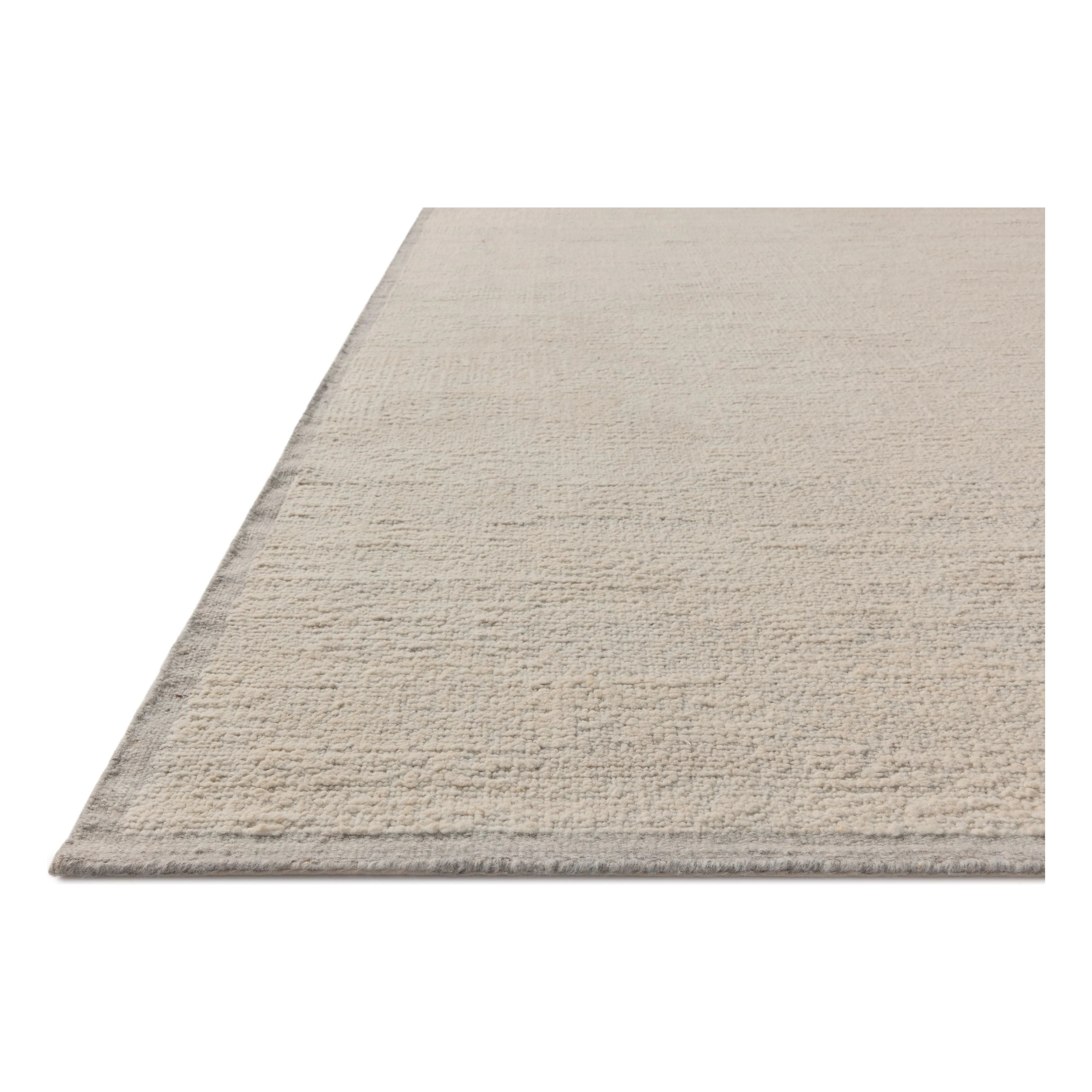 The Dakota Collection by Amber Lewis x Loloi is a flatweave-style area rug with a muted checkerboard pattern framed with a deeper-toned border. The rug is hand-woven of wool and cotton for a durable, natural warmth in living rooms, bedrooms, and more. Amethyst Home provides interior design, new home construction design consulting, vintage area rugs, and lighting in the Los Angeles metro area.