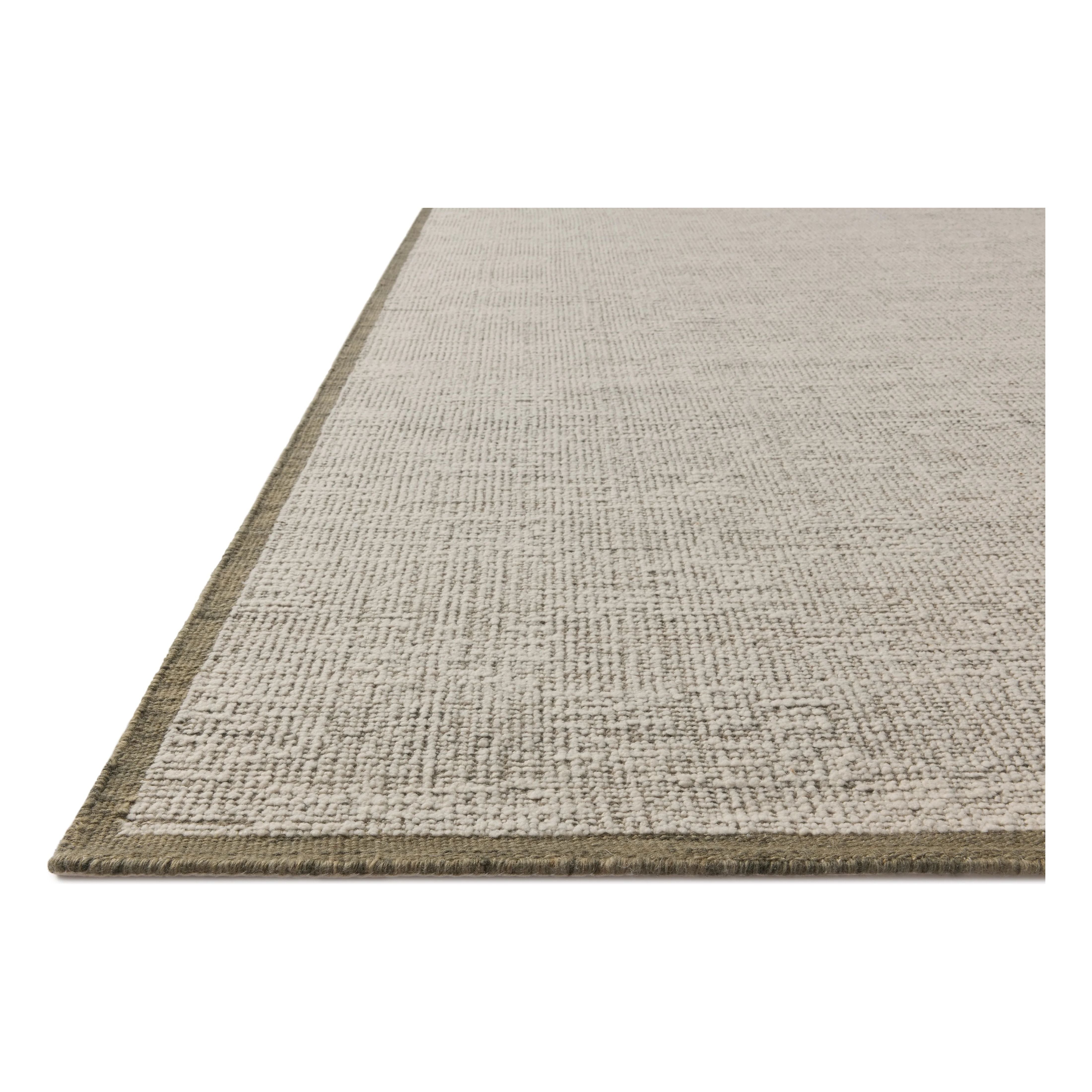 The Dakota Collection by Amber Lewis x Loloi is a flatweave-style area rug with a muted checkerboard pattern framed with a deeper-toned border. The rug is hand-woven of wool and cotton for a durable, natural warmth in living rooms, bedrooms, and more. Amethyst Home provides interior design, new home construction design consulting, vintage area rugs, and lighting in the Laguna Beach metro area.