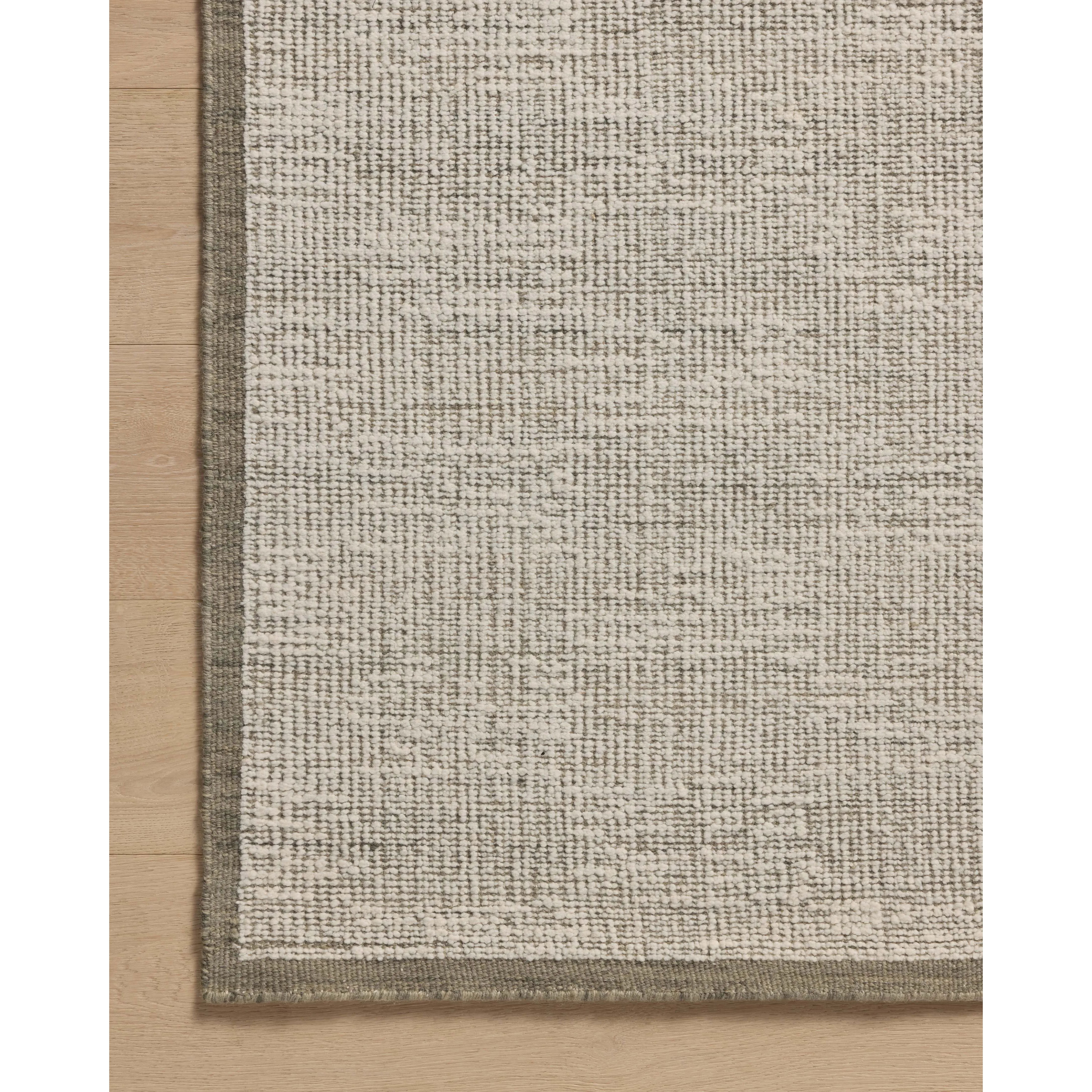 Featuring Amber Lewis x Loloi Dakota Olive / Ivory Rug by Loloi at Amethyst Home. The Dakota Collection by Amber Lewis x Loloi is a flatweave-style area rug with a muted checkerboard pattern framed with a deeper-toned border. The rug is hand-woven of wool and cotton for a durable, natural warmth in living rooms, bedrooms, and more. This collection is handma. Amethyst Home provides interior design, new home construction design consulting, vintage area rugs, and lighting in the Park City metro area.
