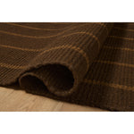 The Harlan Collection by Amber Lewis x Loloi is a classic striped flatweave area rug in the interior designer’s signature warm, earthy tones. The rug has a chunky wool pile with whipstitch borders that add character and natural texture to living rooms, bedrooms, and other well-loved areas of the home. Amethyst Home provides interior design, new home construction design consulting, vintage area rugs, and lighting in the Dallas metro area.