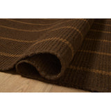 The Harlan Collection by Amber Lewis x Loloi is a classic striped flatweave area rug in the interior designer’s signature warm, earthy tones. The rug has a chunky wool pile with whipstitch borders that add character and natural texture to living rooms, bedrooms, and other well-loved areas of the home. Amethyst Home provides interior design, new home construction design consulting, vintage area rugs, and lighting in the Dallas metro area.