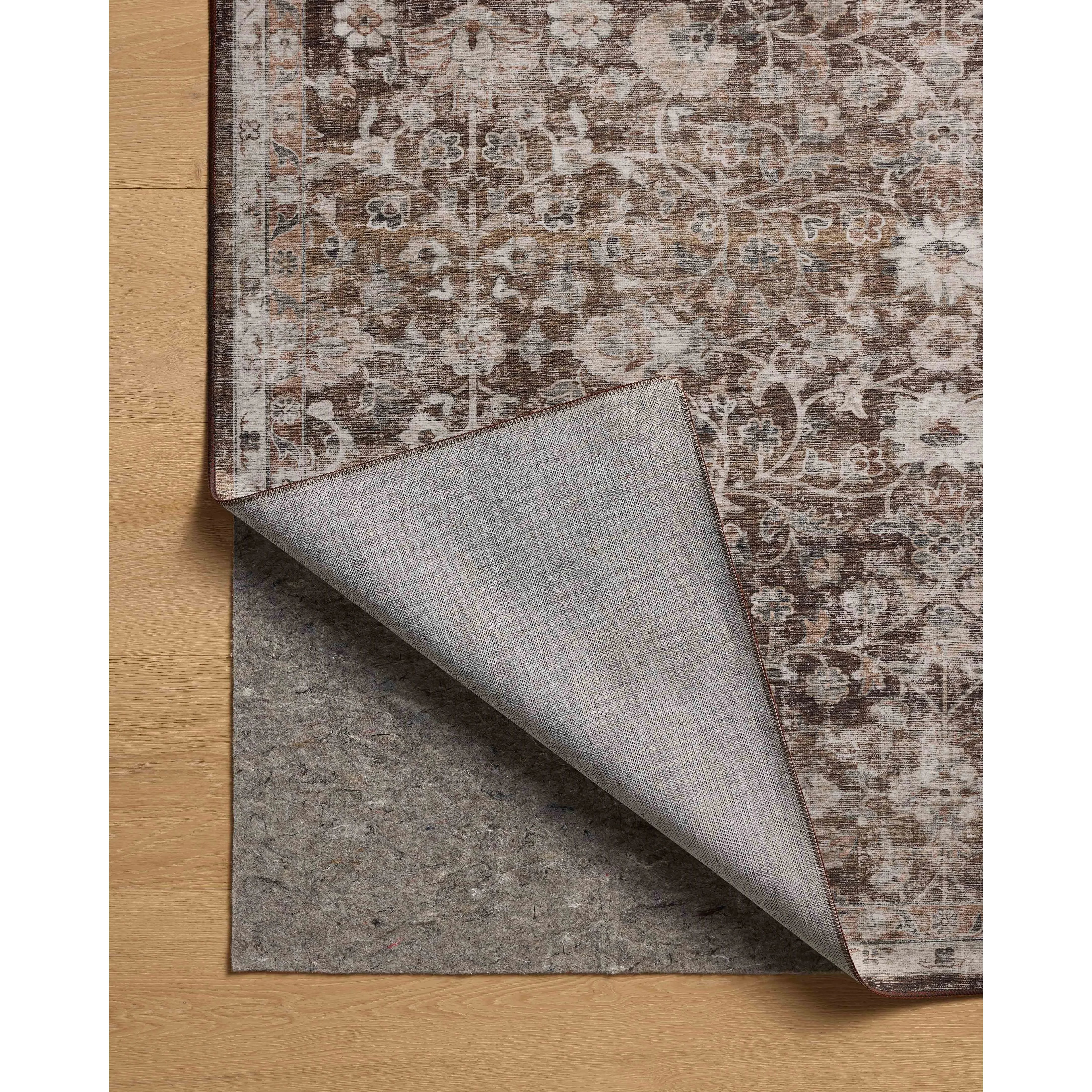 The Josie Collection is a machine-washable area rug with an exceptional design by Amber Lewis x Loloi. The rugs beautiful, vintage-inspired motifs in rich, earthy tones raise the standard for washable rugs. Amethyst Home provides interior design, new home construction design consulting, vintage area rugs, and lighting in the Boston metro area.