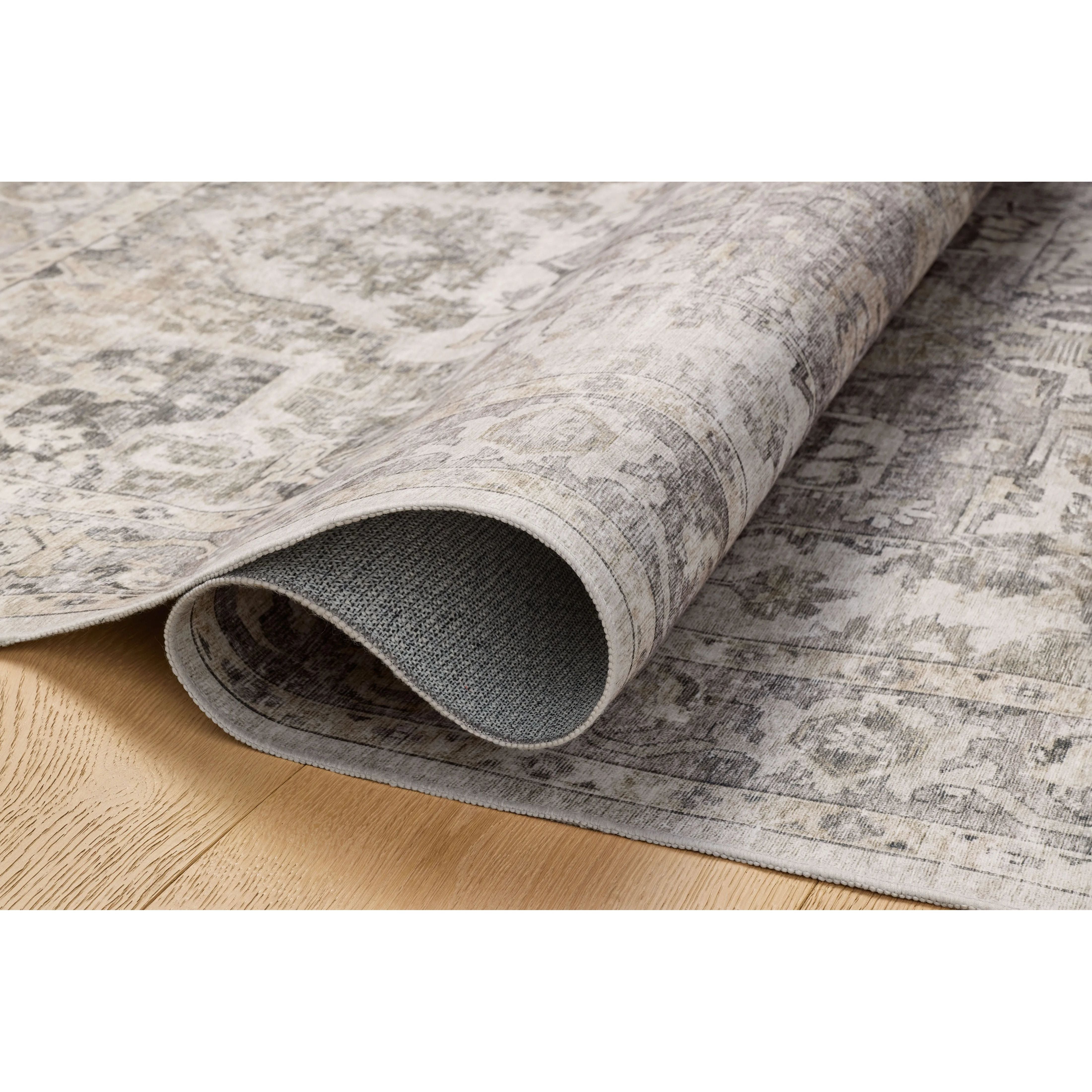 The Josie Collection is a machine-washable area rug with an exceptional design by Amber Lewis x Loloi. The rugs beautiful, vintage-inspired motifs in rich, earthy tones raise the standard for washable rugs. Amethyst Home provides interior design, new home construction design consulting, vintage area rugs, and lighting in the Boston metro area.