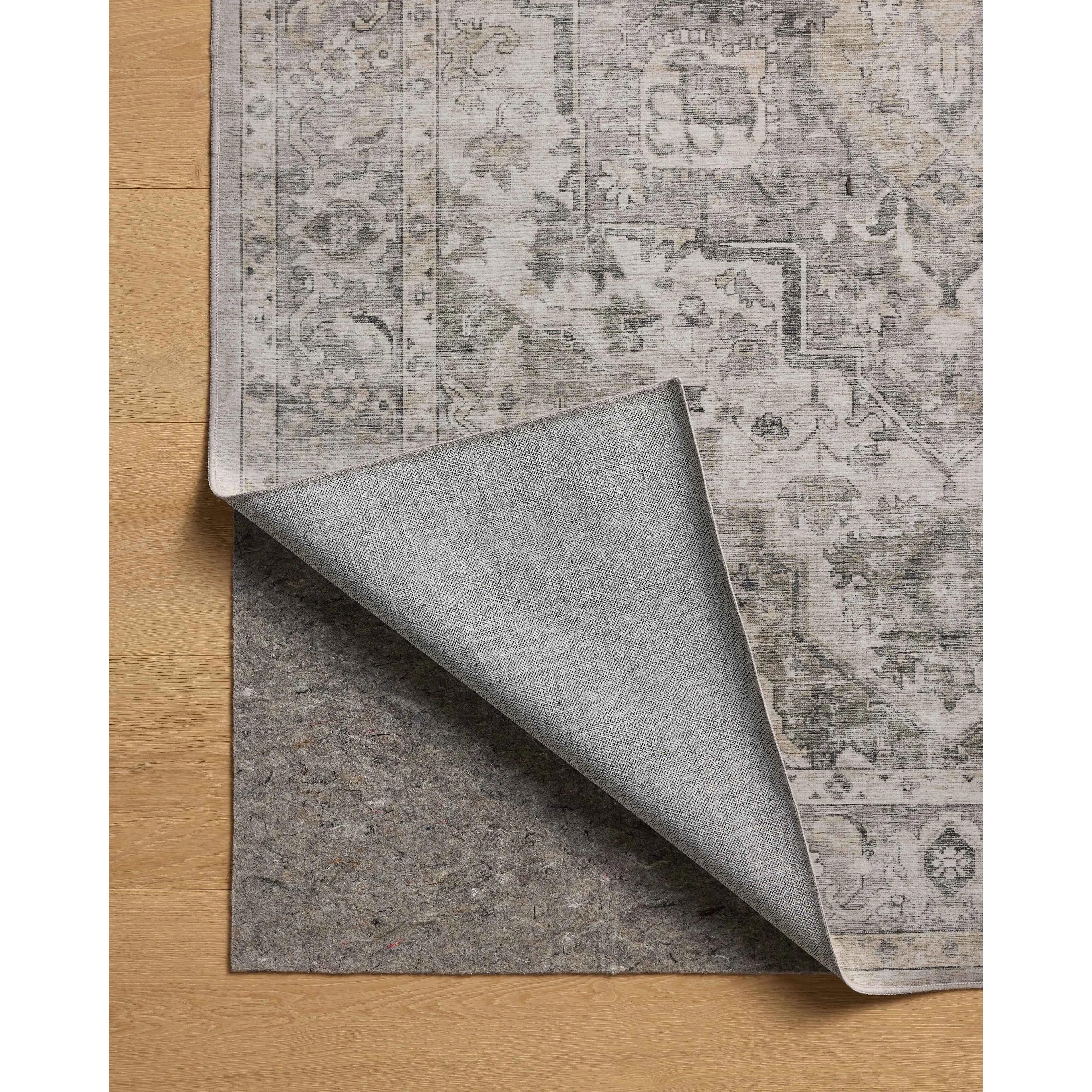 The Josie Collection is a machine-washable area rug with an exceptional design by Amber Lewis x Loloi. The rugs beautiful, vintage-inspired motifs in rich, earthy tones raise the standard for washable rugs. Amethyst Home provides interior design, new home construction design consulting, vintage area rugs, and lighting in the Los Angeles metro area.